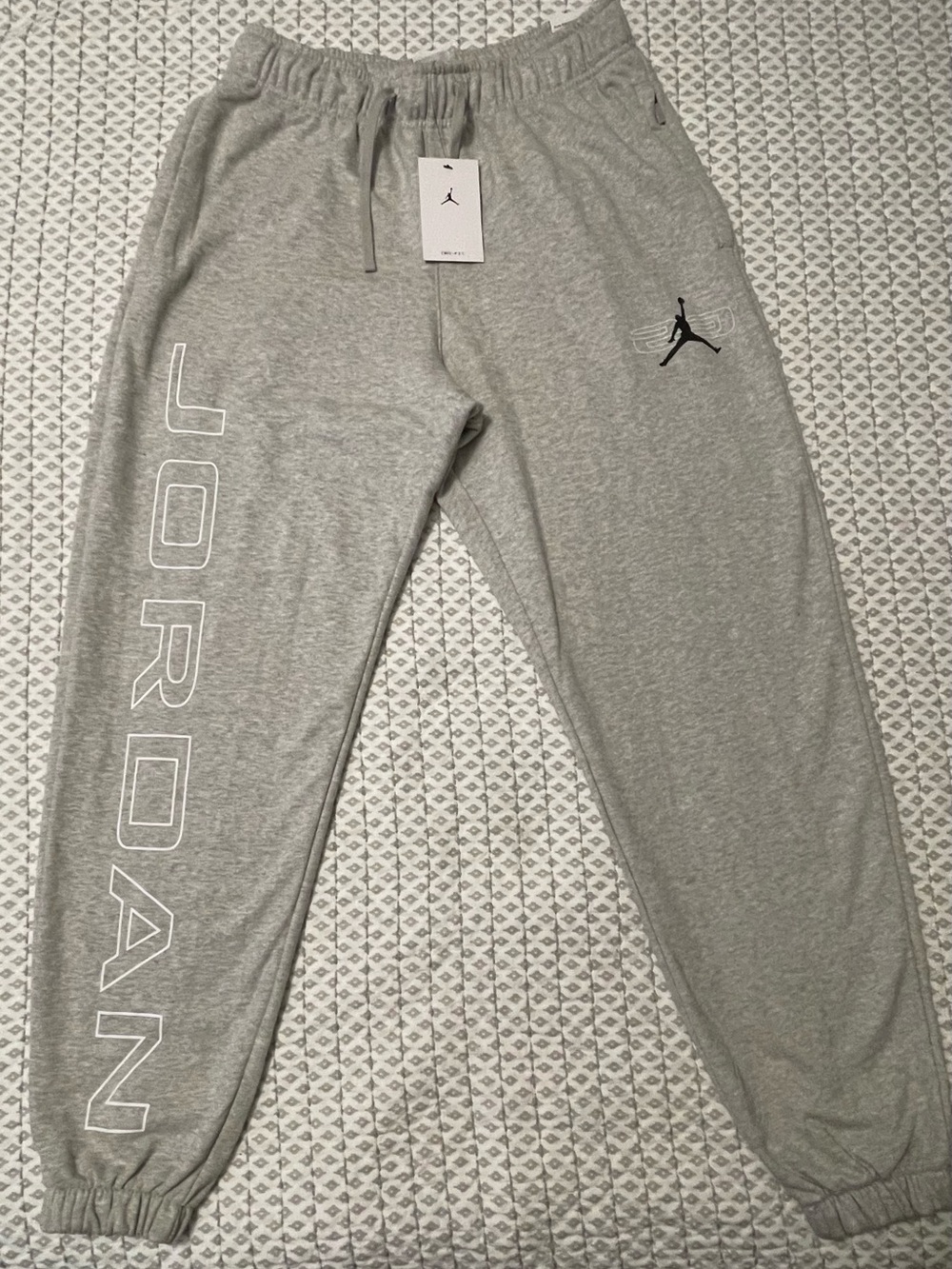 Jordan men’s Light Gray Jogger Sweatpants with White Lettering